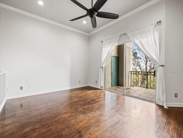 empty room with dark hardwood / wood-style flooring, ceiling fan, and ornamental molding