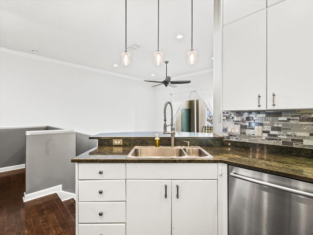 kitchen featuring dishwasher, dark hardwood / wood-style floors, white cabinetry, and sink