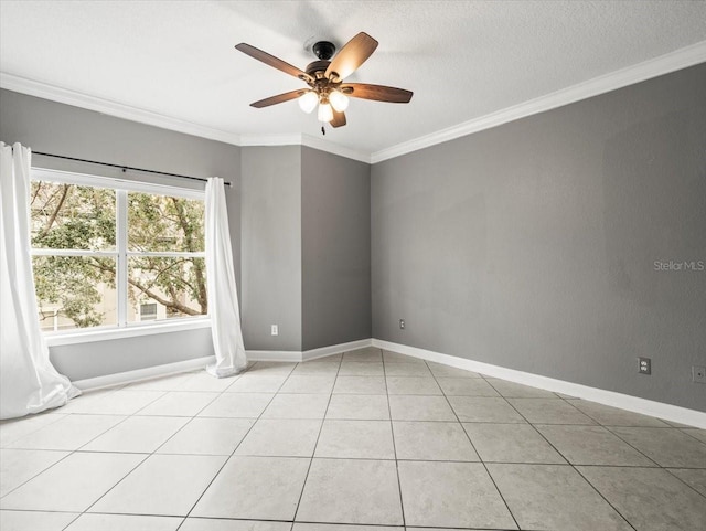 tiled empty room featuring ceiling fan, ornamental molding, and a textured ceiling