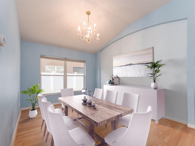 dining space with light wood-type flooring, lofted ceiling, and a chandelier