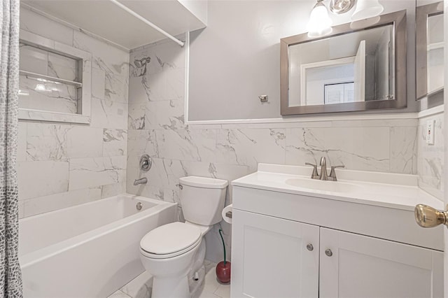 full bathroom featuring vanity, toilet, shower / bath combo with shower curtain, and tile walls