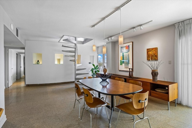 dining area with rail lighting