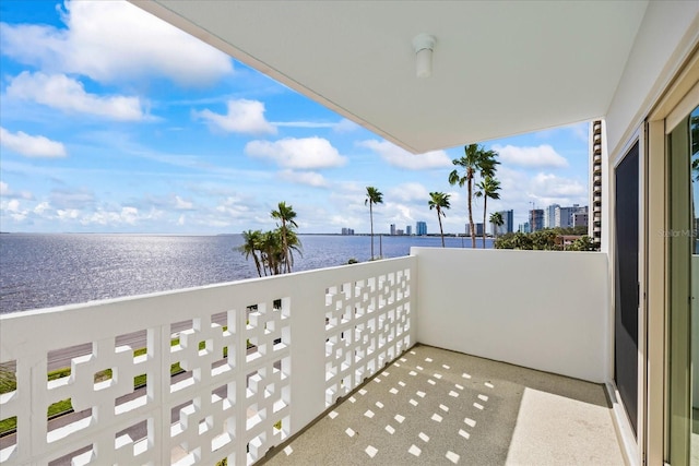 balcony featuring a water view