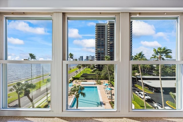 entryway with a water view and a wealth of natural light