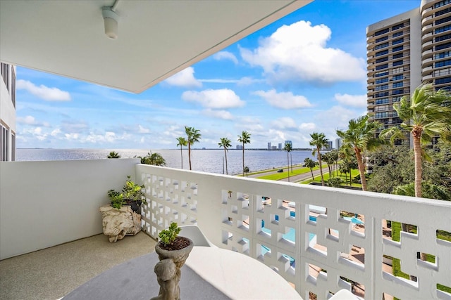 balcony featuring a water view