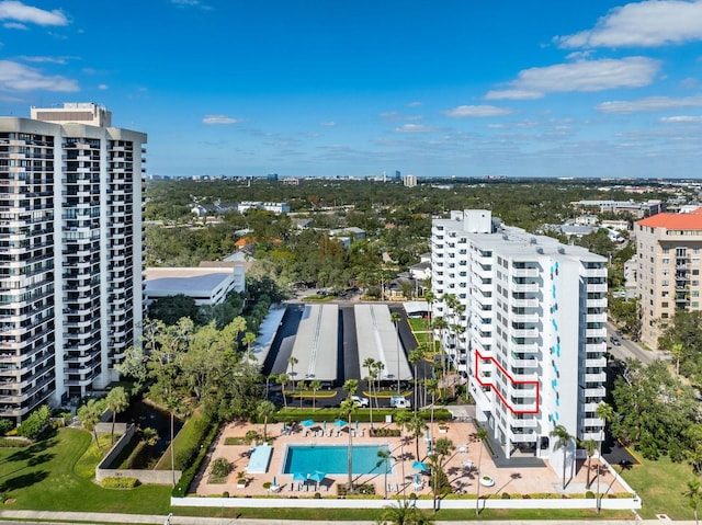 birds eye view of property with a view of city
