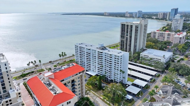aerial view featuring a city view and a water view