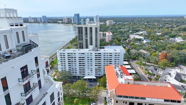 drone / aerial view with a water view and a view of city