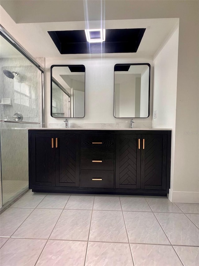 bathroom featuring vanity, tile patterned floors, and walk in shower