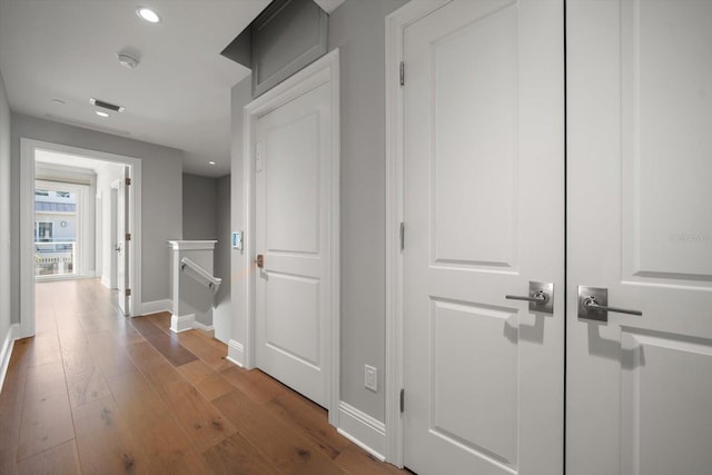 hall featuring dark wood-type flooring