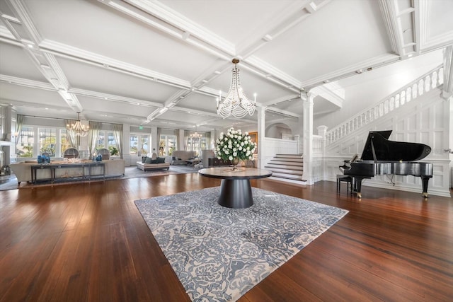 interior space with beamed ceiling, dark hardwood / wood-style floors, decorative columns, and coffered ceiling