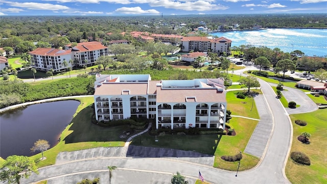 birds eye view of property featuring a water view