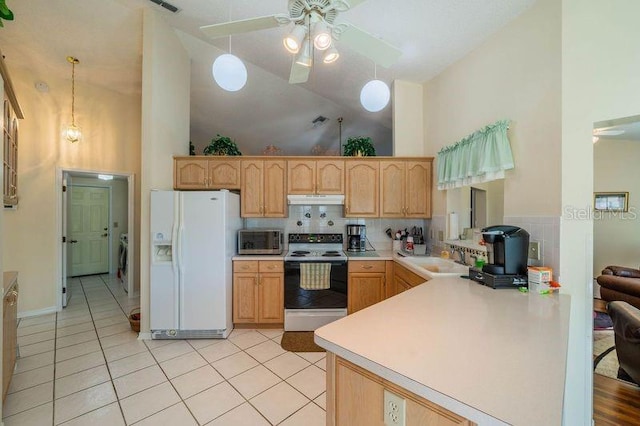 kitchen with decorative light fixtures, white appliances, light brown cabinetry, and high vaulted ceiling