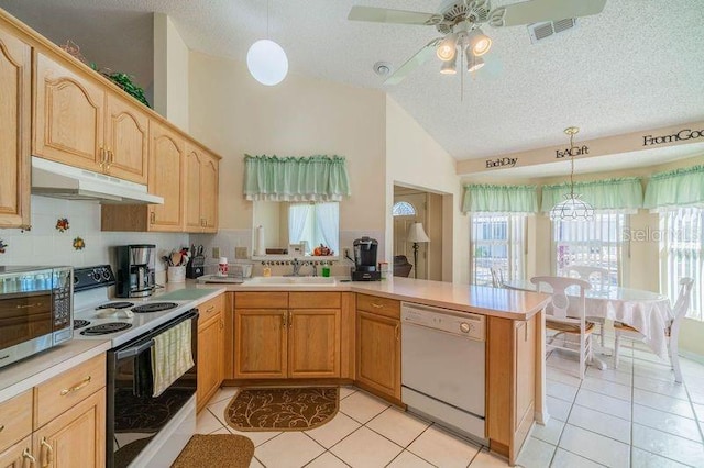 kitchen with white appliances, backsplash, hanging light fixtures, a textured ceiling, and kitchen peninsula