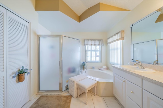 bathroom with a textured ceiling, vanity, independent shower and bath, tile patterned flooring, and lofted ceiling