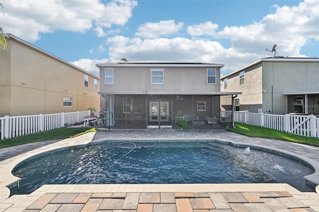 view of pool featuring a sunroom