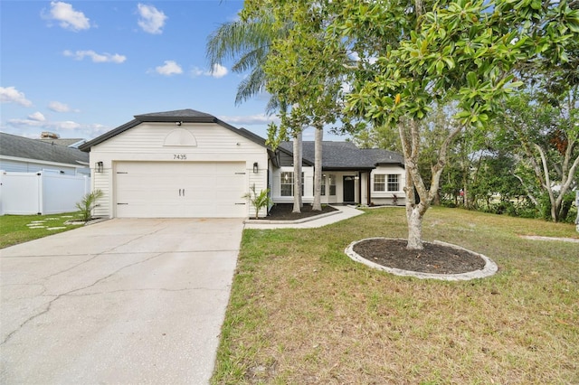 ranch-style house with a front lawn and a garage