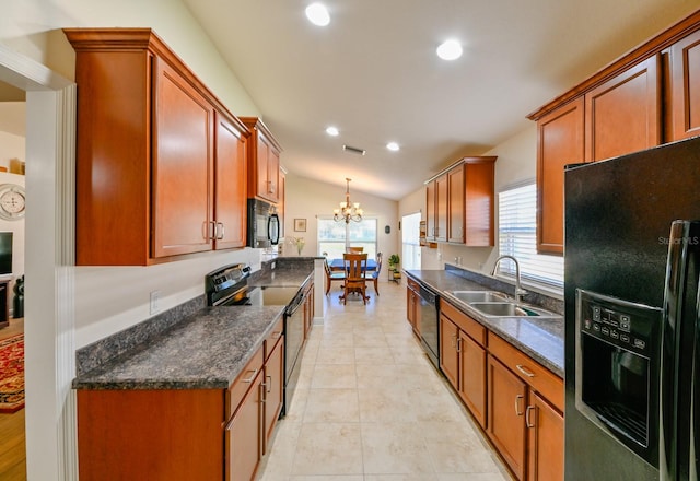 kitchen featuring sink, an inviting chandelier, pendant lighting, vaulted ceiling, and black appliances