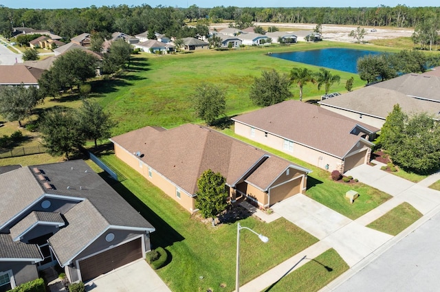 drone / aerial view with a water view