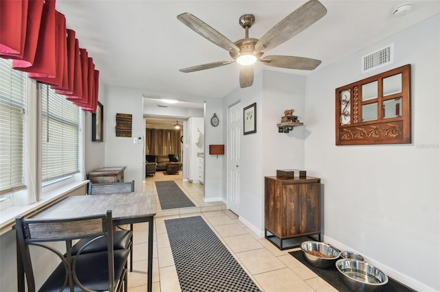 interior space featuring light tile patterned floors