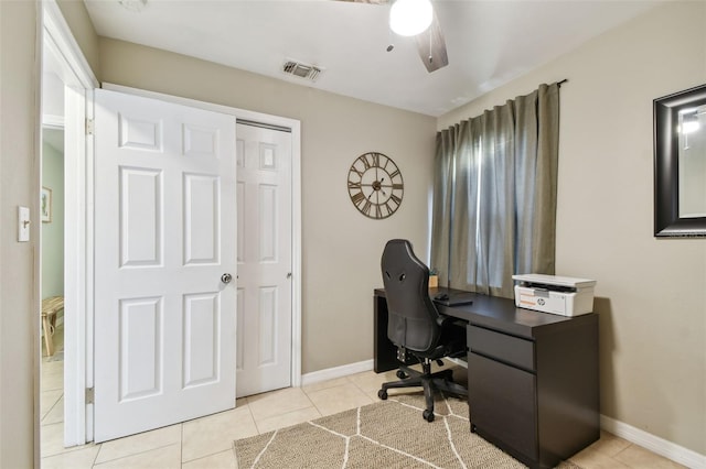 office space featuring ceiling fan and light tile patterned flooring