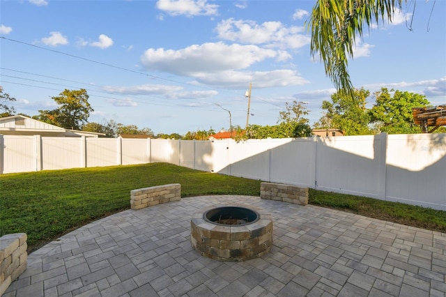 view of patio featuring a fire pit