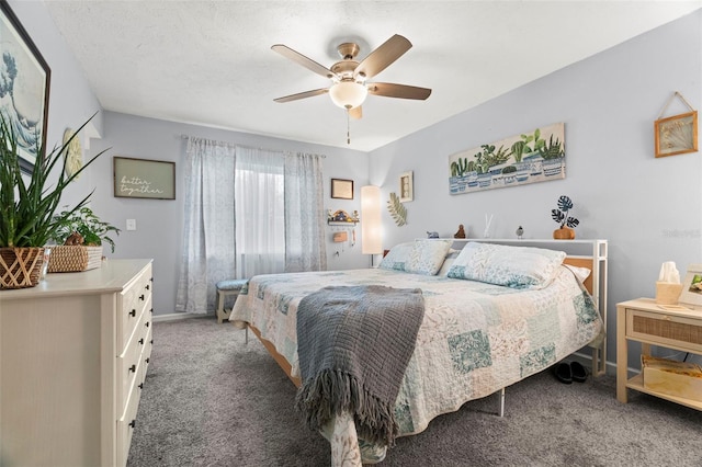 bedroom with ceiling fan and carpet flooring