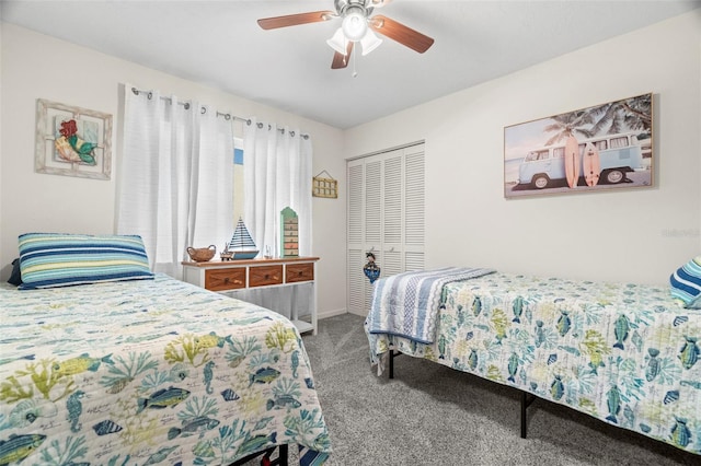 carpeted bedroom featuring a closet and ceiling fan