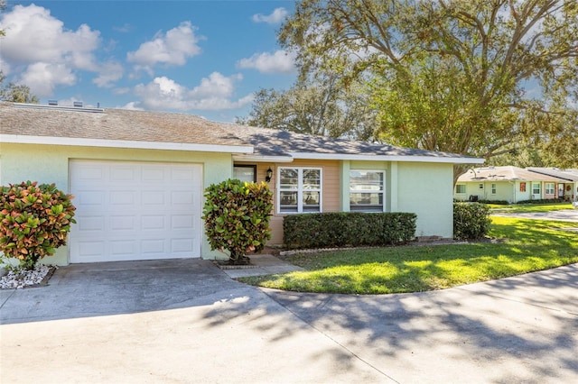 single story home featuring a garage