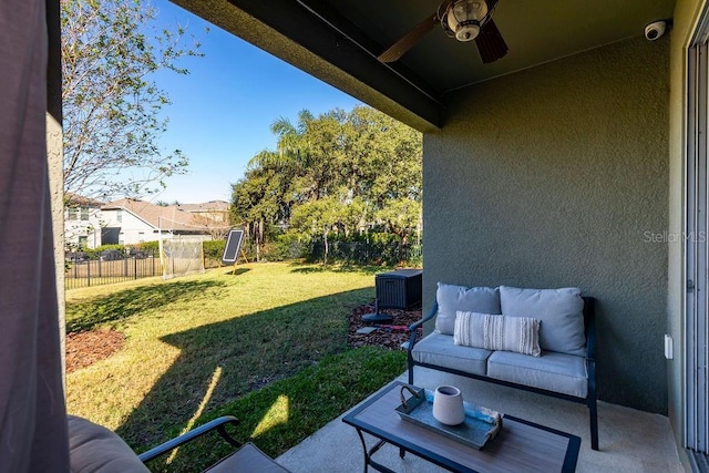 view of yard featuring ceiling fan