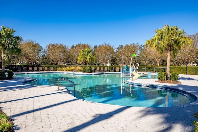 view of swimming pool featuring a patio