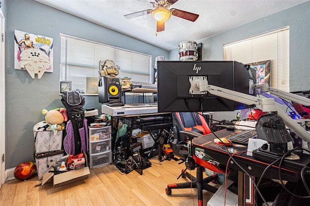 9696 Groveland St, Seminole, FL 33772 - office featuring hardwood / wood-style flooring, a textured ceiling, and ceiling fan