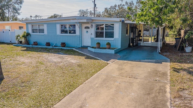 9696 Groveland St, Seminole, FL 33772 - view of front of home with a front yard