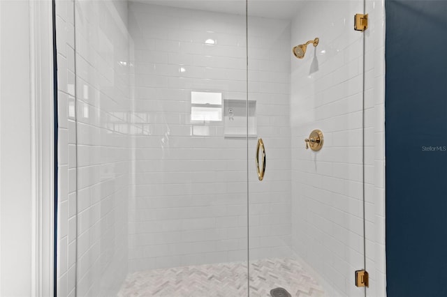 bathroom featuring an enclosed shower