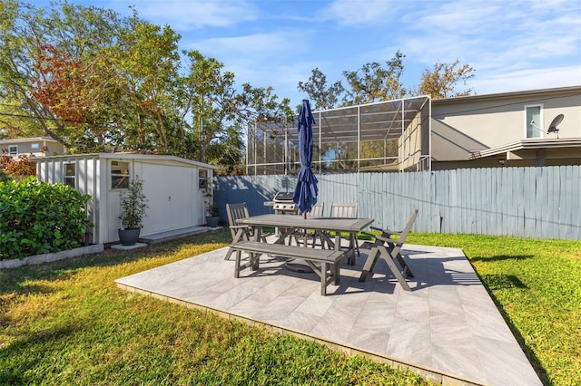 view of patio / terrace with an outbuilding