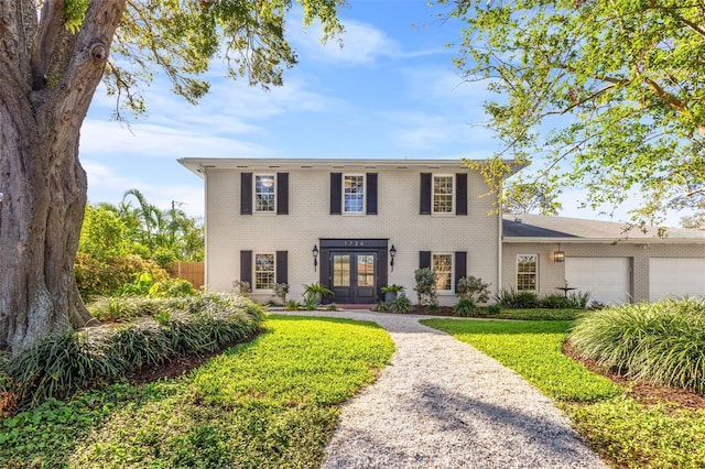 view of front of house featuring french doors and a garage