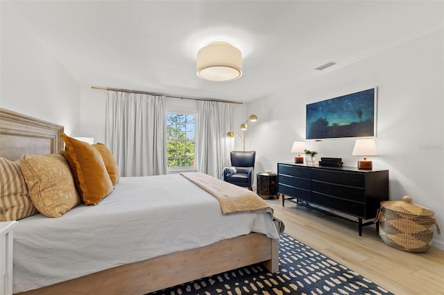 bedroom featuring hardwood / wood-style flooring