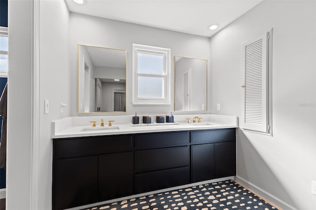 bathroom with vanity and tile patterned floors