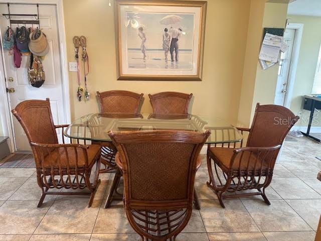 sitting room with light tile patterned floors