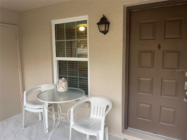 doorway to property with a porch