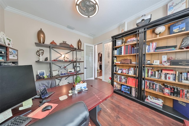 home office featuring hardwood / wood-style flooring and ornamental molding