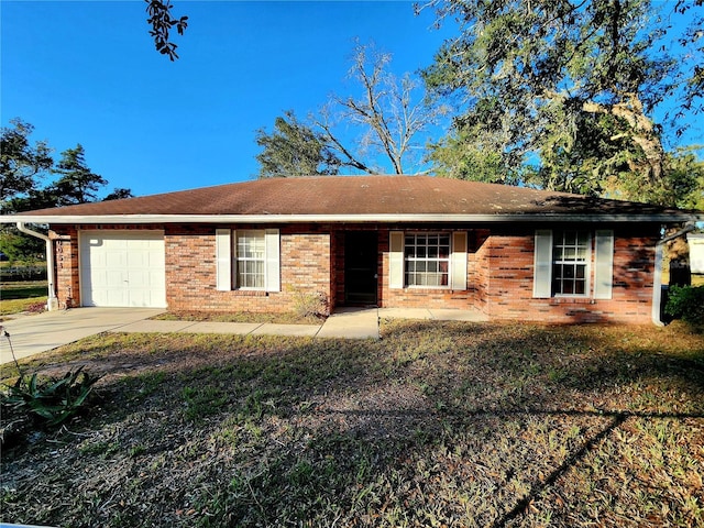 single story home featuring a garage