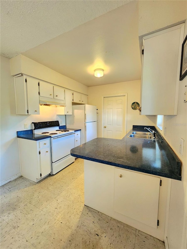 kitchen with a textured ceiling, sink, white cabinets, and white appliances