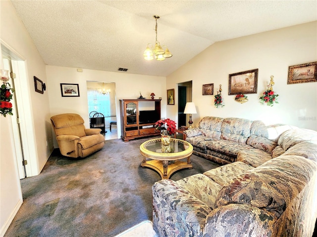 carpeted living room featuring a textured ceiling, vaulted ceiling, and an inviting chandelier