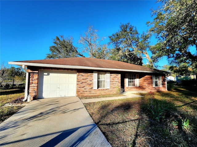 single story home with a garage