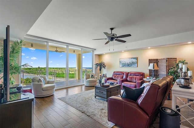 living room featuring hardwood / wood-style flooring and expansive windows