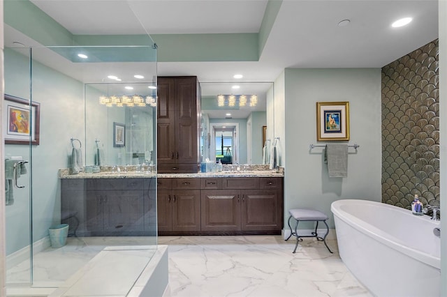 bathroom featuring vanity and plus walk in shower