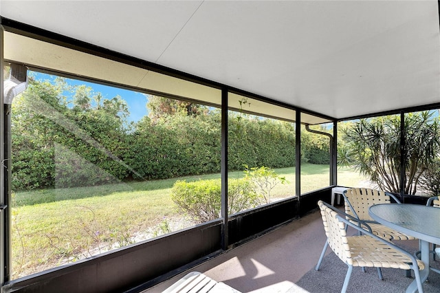 unfurnished sunroom with plenty of natural light