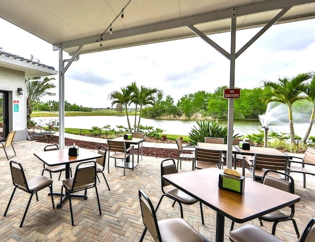 view of patio / terrace featuring a water view