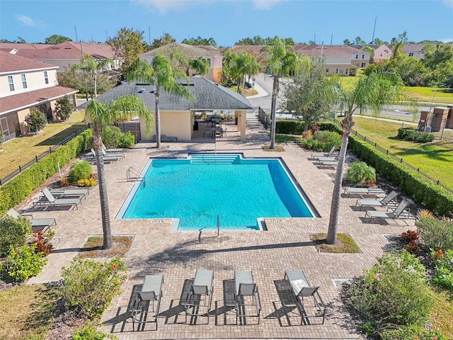 view of swimming pool with a patio area